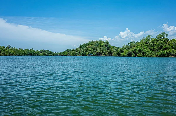 The calm water and islands of Koggala Lake